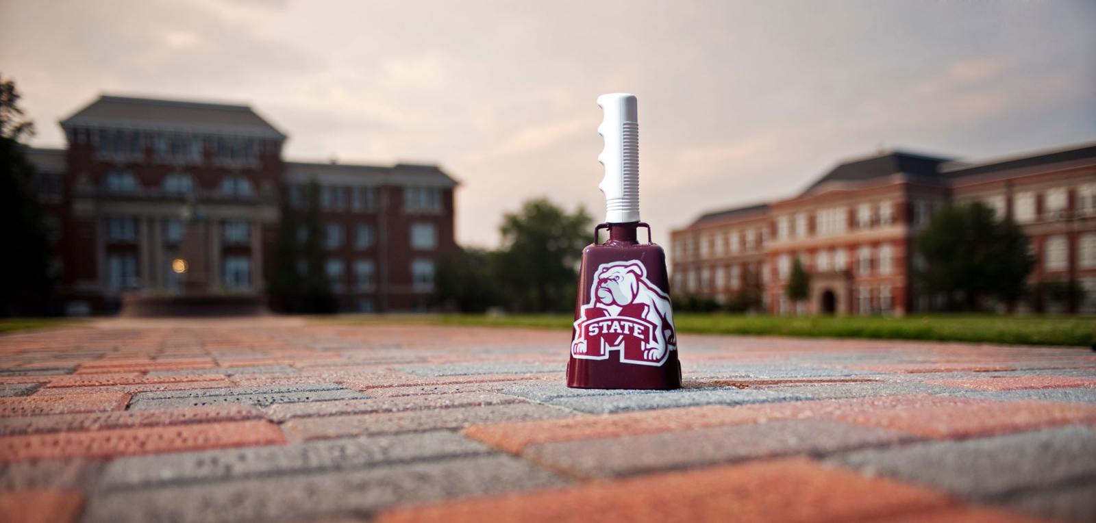 Cowbell on sidewalk of the Drill Field