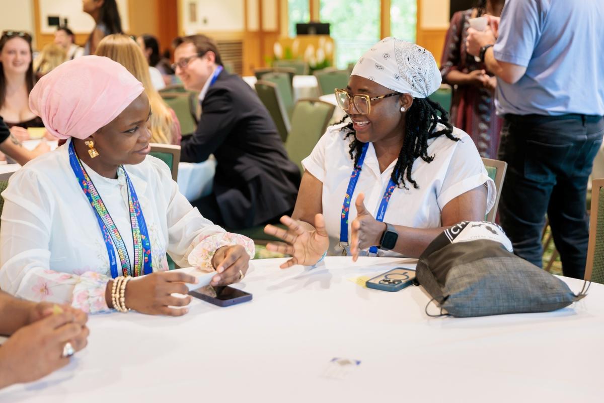 Mississippi State Ph.D. student Azeezat Abdulraheem participates in group conversation at a chemistry conference